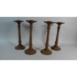 A Set of Four Continental Cast Iron Church Candlesticks, 30cms High