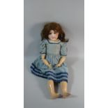 A French 19th Century Bisque Head Doll with Sleeping Eyes, Open Mouth, Painted Lashes and Brows