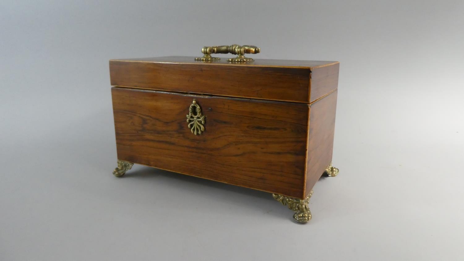 A Mid 19th Century Rosewood Two Division Tea Caddy with Ormolu Claw Feet and Carrying Handle,