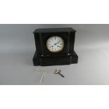 A Black Slate Mantle Clock of Architectural Form, 32cm Wide