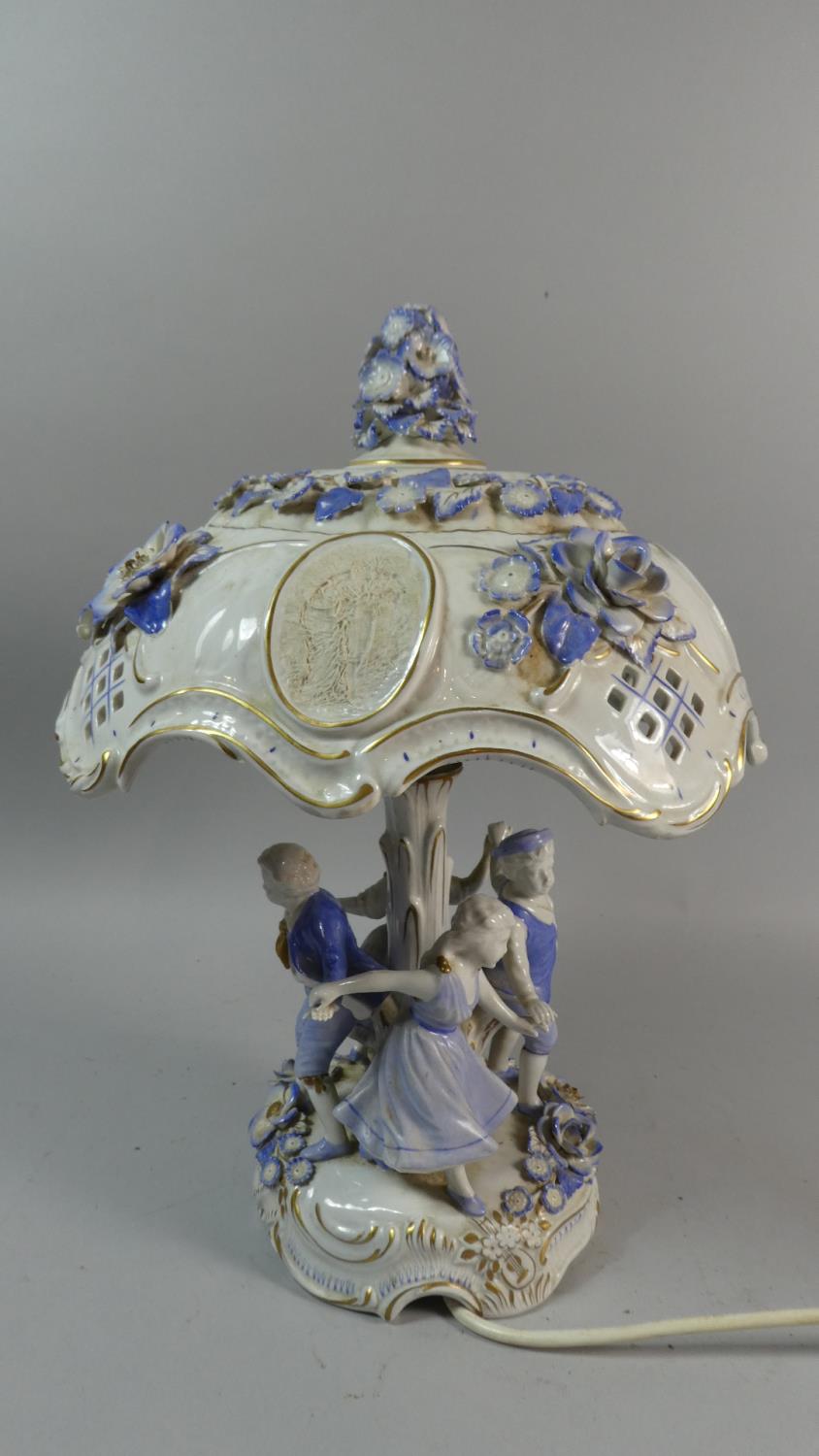 A Late 20th Century East German Porcelain Table Lamp in the Form of Children Playing Ring a Ring - Image 2 of 9