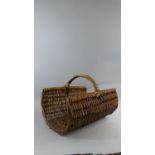 A Wicker Log Basket, 51cm Long