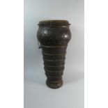 A Late 19th/Early 20th Century African Carved Wooden Drum. 55cms High