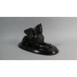 A Continental Museum Replica Winged Sphinx on Ebonised Wooden Plinth. 30cms Wide
