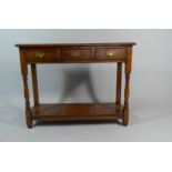 A Modern Oak Narrow Hall Table with Three Drawers and Pot Board Shelf, 99cm Wide