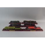 A Collection of Six Model Trains Set on Wooden Plinths to Include Three British and Three