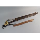 A 19th Century Dyak Head Hunters Sword or Mandau with Carved Bone Handle, Engraved Blade and