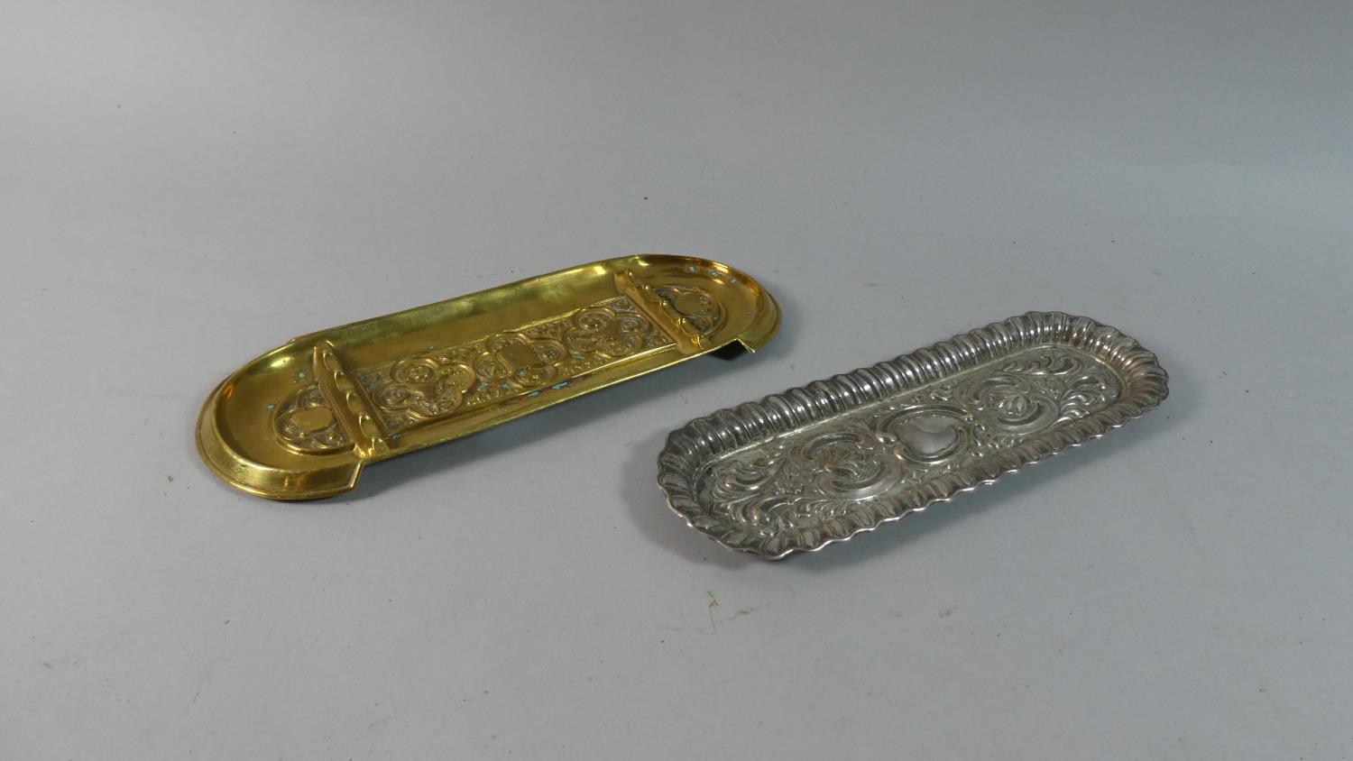 A French Pressed Brass Desk Top Pen Tray and a Pressed Silver Plate Example, Each 24cm Long