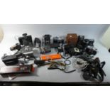 A Collection of Various Vintage Cameras, Telescopic Lens, Battery Pack, Flash Guns etc