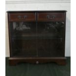 A Late 20th Century Mahogany Glazed Bookcase with String Inlay Decoration and Two Top Drawers, 75.