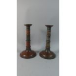 A Pair of Late 19th Century Enamelled Bronze Candle Sticks with Etched Foliate Decoration and