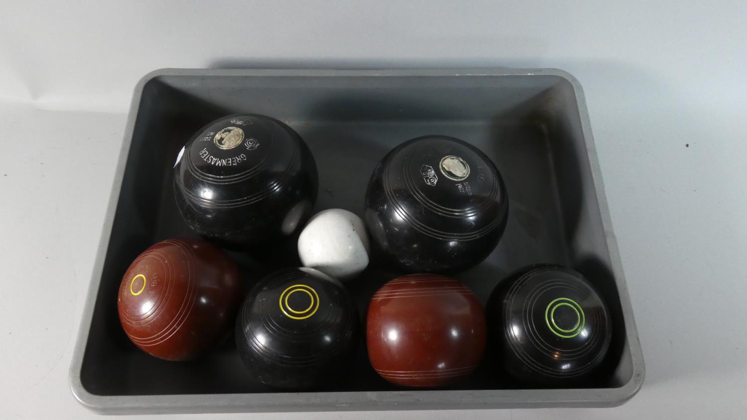 A Collection of Seven Various Lawn Bowls and Jacks