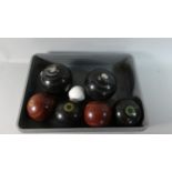 A Collection of Seven Various Lawn Bowls and Jacks