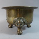 A Chinese Bronze Three Footed Censer with Temple Dog Mask Feet, 24cm Diameter