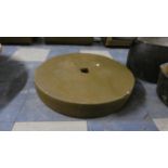 A Circular Green Painted Grindstone, 58cm Diameter