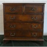 A Mid 20th Century Crossbanded Mahogany Small Chest of Two Short and Three Long Drawers on Bracket