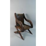 A 19th Century Carved Oak Apprentice Style Piece in the Form of a Glastonbury Armchair, 44cm high