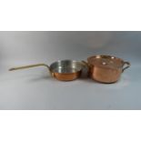 A Brass Handled Copper Frying Pan and a Similar Saucepan with Lid, 25cm Diameter