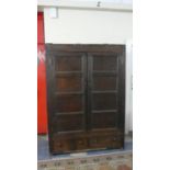 An Early Welsh Oak Livery Cupboard with Two Base Drawers and Panelled Doors, In Need of Full