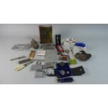 A Tray of Curios to Include Cigarette Lighters, Cigarette Case, Manicure Tools, Thimbles,