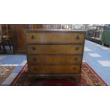 A Mid 20th Century Walnut Veneered Chest of Four Long Drawers with Bracket Feet, 77.5cm Wide