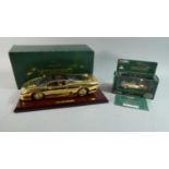 A Gilt Diecast Model of a Jaguar XJ220 Together with a Corgi Classic Limited Edition Gold Plated