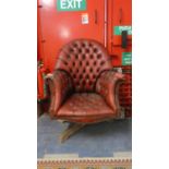 A Buttoned Leather Swivel Office Armchair for Full Reupholstery and Missing One Leg