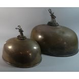 An Impressive Graduated Pair of Silver Plated Oval Meat Covers with Finials in the form of Stags