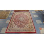 A Belgian Samarkand Patterned Rug on Red Ground 198cm x 137cm