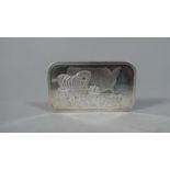 An American Silver 1oz Ingot Decorated with Wagon Train and Map of America