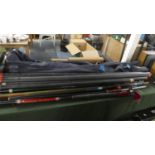 A Large Collection of Fishing Pole Tubes, Carrying Bags, Fishing Umbrella etc