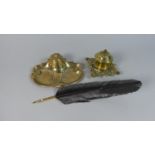 Two French Brass Desk Top Inkwells and a Reproduction Quill Pen