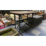 A Singer Treadle Sewing Machine Base Converted to Garden Table, 99cm Wide