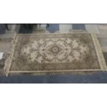 A Patterned Super Keshan Woollen Hearth Rug on Faun Ground, 170cm Long