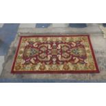 A Patterned Hearth Rug, 112cm Wide