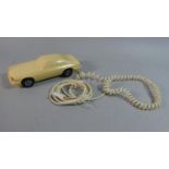 A Novelty Telephone in the Form of a Jaguar XJS