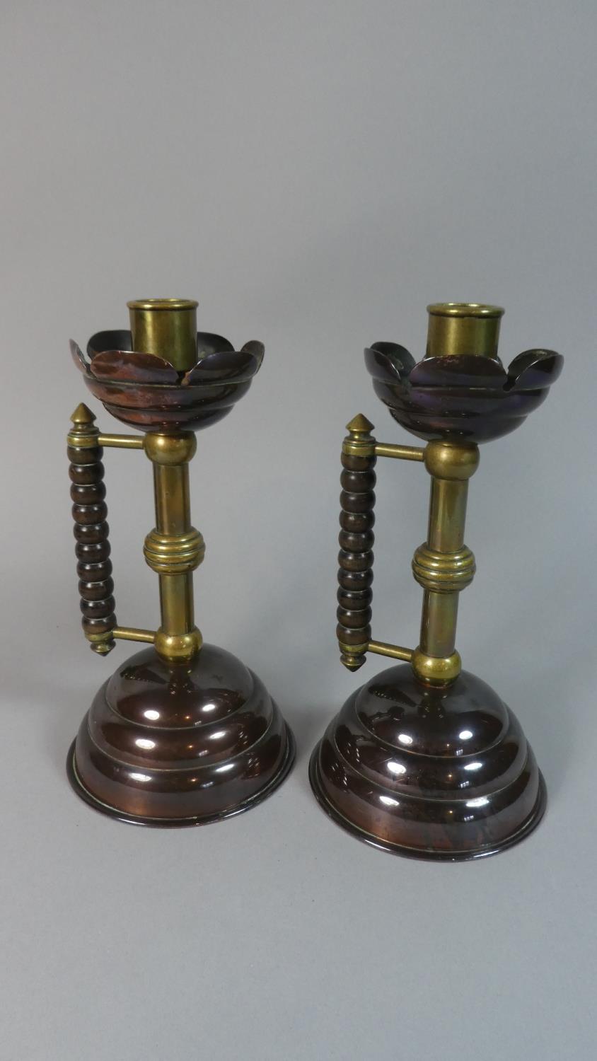 A Pair of Arts and Crafts Candlesticks After Christopher Dresser by Benham and Froud, Reg. 53791