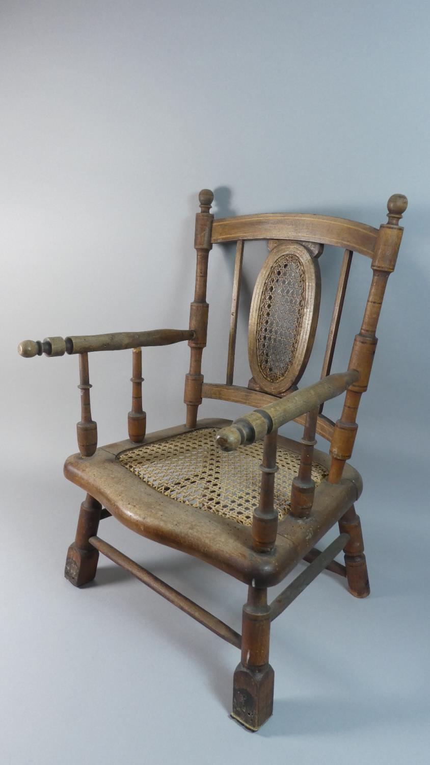 A Late 19th Century Inlaid Cane Seated and Back Childs Armchair, 59cm High