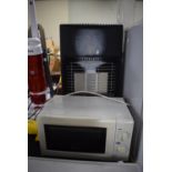 A Microwave Oven and a Gas Heater