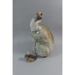An Unglazed Stoneware Study of a Gannet and Her Chick, 40cm High