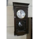 An Edwardian Mahogany Wall Clock, 80cm high