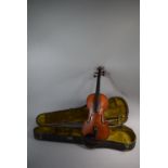 An Early 20th Century Spruce Full Scale Violin and Bow. Violin in need of some attention but