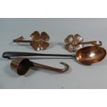 Two Copper Floral Tiebacks and Two Copper Ladles