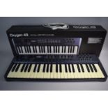 An Oxygen 49, 49 Key USB Midi Controller with Box