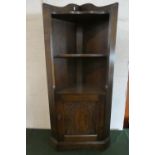 A Mid 20th Century Oak Freestanding Corner Cabinet with Three Shelves, Galleried Top and Cupboard