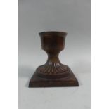 A Bronze Effect Candle Stick Holder on Square Plinth, 15.5cm High