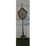 A 19th Century Pole Screen with Tapestry Rise and Fall Shield Shaped Screen