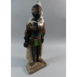 A Painted Cast Metal Doorstop in the Form of a Medieval Knight, 52cm high, 52cm High