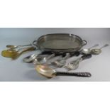 A Silver Plated Oval Gallery Tray Containing Eastern Pierced and Etched White Metal Salad Servers,