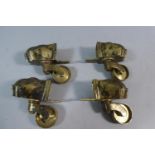 A Set of Four Brass Claw Furniture Casters, Each 8.5cm High